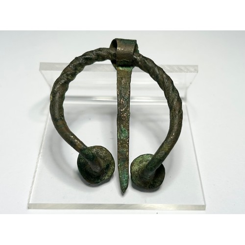 135 - Viking Penannular Brooch. Circa 10th century CE. Northern Europe. Copper-alloy, 47mm x 39mm 14.88g. ... 