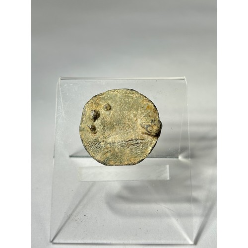 124 - Anglo Saxon Disc Brooch. Circa 9th-11th century CE. Lead, 30mm x 2mm 14.42 grams. A circular brooch ... 