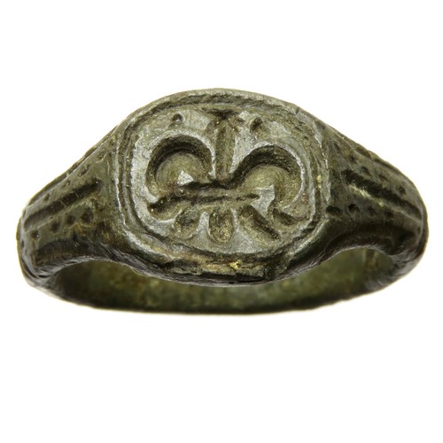 143 - Medieval bronze seal ring. Circa 14th/15th century AD. 33mm diameter, 9.97g, ring size: UK Z; US 12.... 