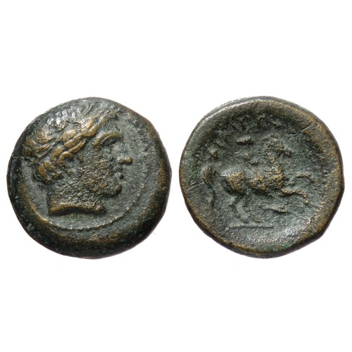 174 - Macadonian Phililip II AE18. Circa 359-336 BCE. Copper-alloy, 17 mm. Diademed head of Apollo right. ... 