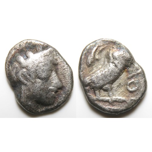 182 - Attica-Athenian Silver Obol. Athens, c. 454-404 BC. 8.5mm. 0.61 grams. Helmeted head of Athena right... 