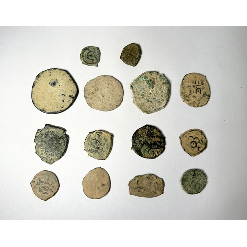 191 - Lot of Ancient Roman Bronze Coins (14). Circa 2nd-7th century CE. An interesting lot of uncleaned co... 