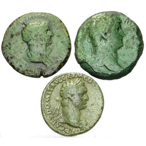 256 - Roman AE Coin Group (3). 1st-2nd century CE. mm. Domitian dupondius, Trajan dupondius and a sesterti... 