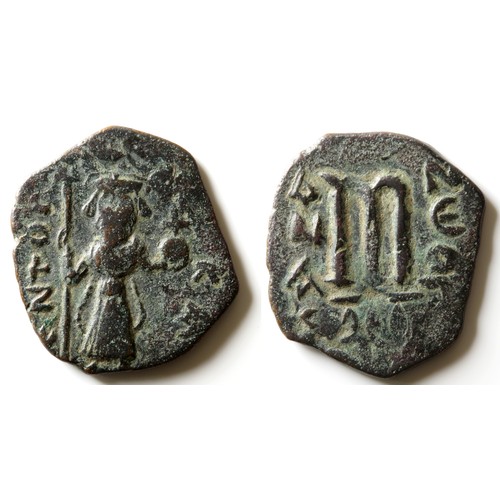 325 - Constans II Follis. Circa 641 - 668 CE. Copper-alloy, 3.2g. 21mm. Standing figure, facing. R. Large ... 