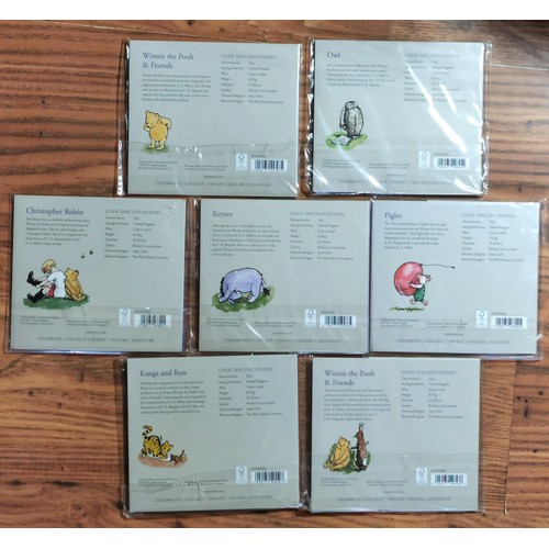 473 - Classic Pooh 50p group. Seven BUNC fifty pence pieces in original packaging. Whinnie the Pooh & ... 