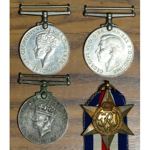 501 - World War II medal group. (4). GSM x 2, the defence medal and the France and Germany star.