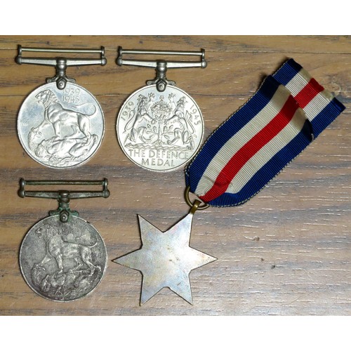 501 - World War II medal group. (4). GSM x 2, the defence medal and the France and Germany star.