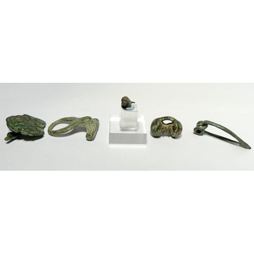 56 - Collection Of Iron Age Artefacts (5). To include, a silver bird mount or amulet, La Tene brooch, sec... 