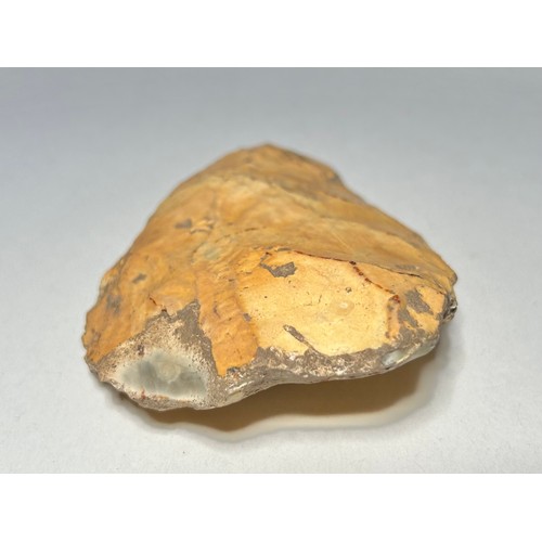 4 - Ancient British Paleolithic flint hand axe. Circa 500,000-180,000 BCE. 92.86 mm. A bifacially worked... 