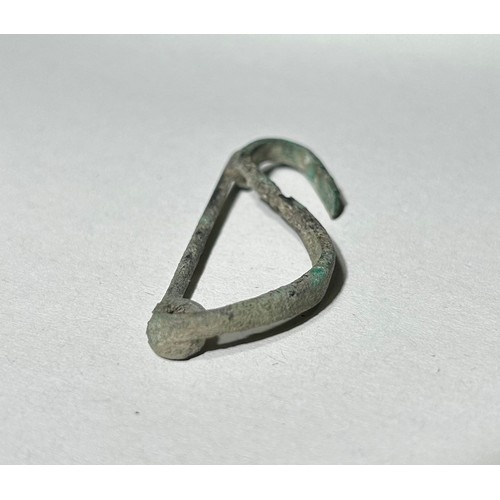 10 - European Iron Age Single Piece Bow-Shaped Brooch. Circa 600 BCE. Copper-alloy, 6.69g. 53.36mm. Itali... 