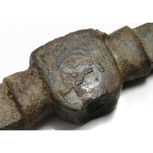 50 - Medieval purse bar. Formed of a central boss with two long arms that extend on either side. Inscribe... 