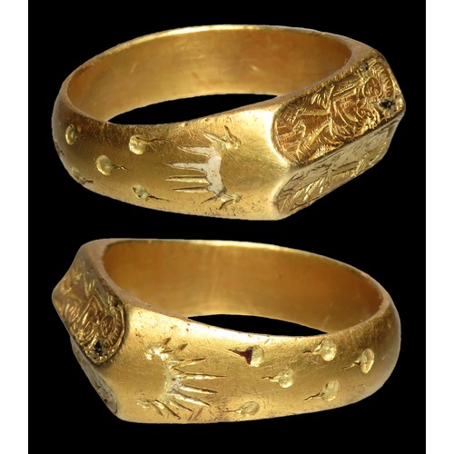 59 - Medieval Iconographic Gold Finger Ring, c. 15th century CE.The ring is finely worked with exceptiona... 