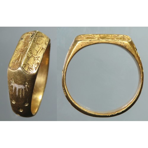 59 - Medieval Iconographic Gold Finger Ring, c. 15th century CE.The ring is finely worked with exceptiona... 
