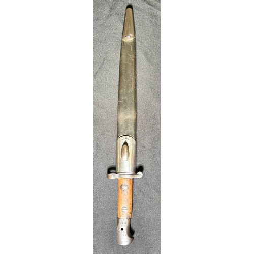 76 - British Military Pattern 1903 sword bayonet, with scabbard. A fine example with two piece wooden gri... 