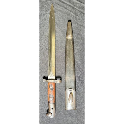 76 - British Military Pattern 1903 sword bayonet, with scabbard. A fine example with two piece wooden gri... 