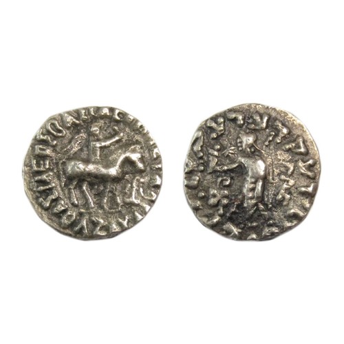 85 - Indo-Scythian Silver Drachm. Circa 58-12 BC. Silver, 1.93g. 15 mm. King mounted on horse right, hold... 