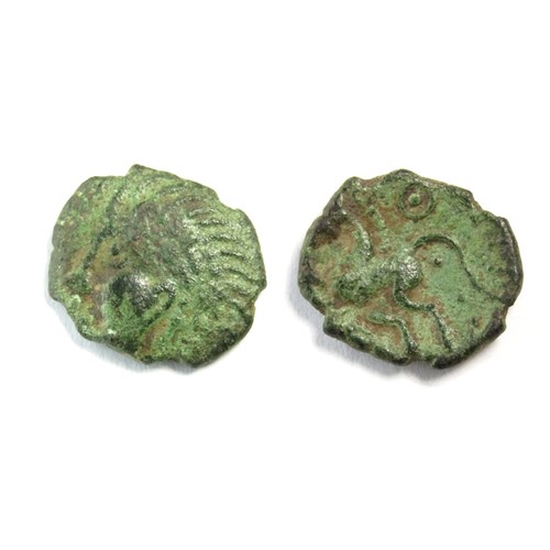 105 - Dubnovellaunos Hairy Bronze Unit. Circa 5 BC-10 AD. 1.89g. 16 mm. Head left, curved wreath from pell... 