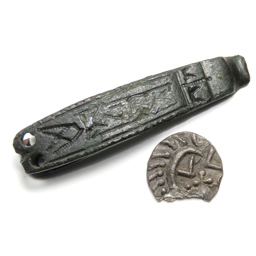 173 - Anglo_Saxon sceat and strap end. 11mm, 0.71g and 34mm, 3.38g. A zoomorphic strap-end with stylised a... 