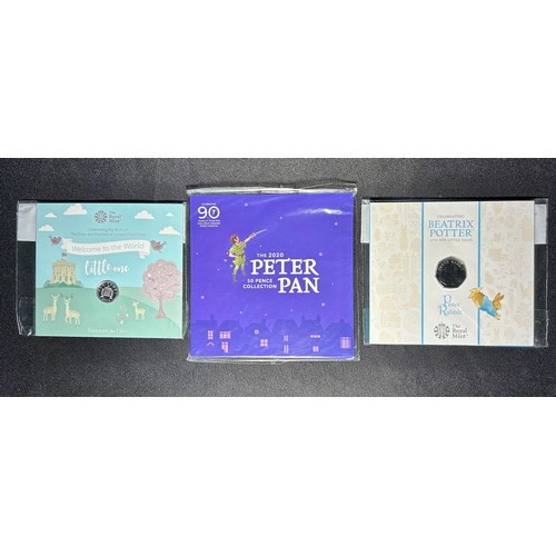 344 - Royal Mint Bunc Coins in collectors packs. 2 x 50p. 2020 Peter Pan, 2020 Peter Rabbit and a silver p... 