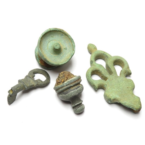 29 - Roman lock and key group. Circa 1st-3rd century CE. A Roman bronze key, trifoliate key handle and tw... 
