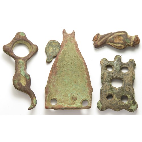 37 - Viking artefact group including a stirrup mount, bridle mount and strap end. C. 11th century, larges... 