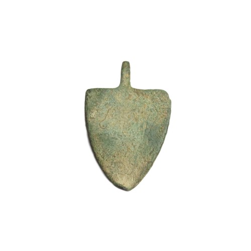 44 - Medieval Heraldic Harness Pendant. Circa 13th century CE. Copper-alloy, 11.58g. 45x26mm. A shield-sh... 