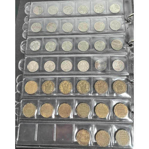 392 - A Collectors Folder, containing British coins and tokens. A quantity of silver, pre 21 and 47. Some ... 