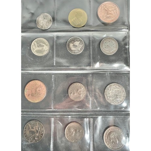 392 - A Collectors Folder, containing British coins and tokens. A quantity of silver, pre 21 and 47. Some ... 