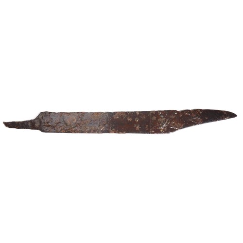 35 - Anglo Saxon Seax. Circa 6th-7th century AD. Iron, 90.62g. 241mm. A large Seax with short tang and lo... 