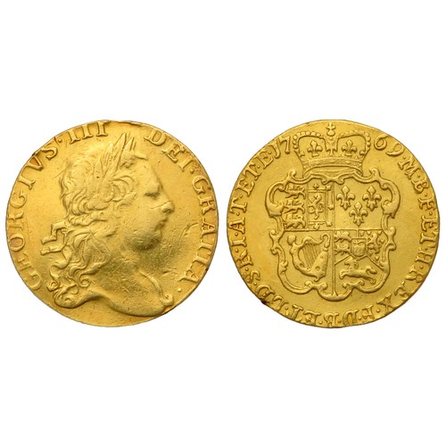 349 - George III Guinea. 1769. Gold, 8.30g. 25mm. Third laureate bust right, GEORGIVS III DEI GRATIA. R. C... 