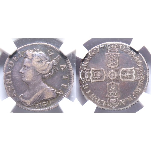 340 - Anne 1703 VIGO Sixpence. Draped bust left, VIGO below. R. Crowned cruciform shields, English shield ... 