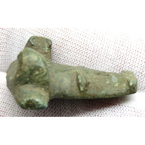 23 - Late Iron Age / Roman bull's head mount. Circa 1st-2nd century CE. Copper-alloy, 30x36mm. A vessel m... 