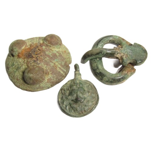 56 - Anglo-Saxon and Medieval Artefact Group (4). D-buckle with large pin, 11th-12th century bronze boss,... 