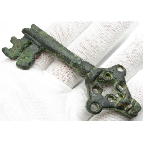 62 - Large Medieval Bronze Key. Circa 14th-15th century CE. An impressive hollow shafted key with an elab... 