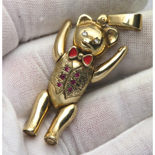 78 - Gold teddy bear with articulated limbs. Hallmarked 9ct, 58mm, 31.6g.