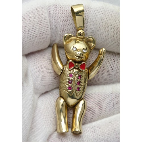 78 - Gold teddy bear with articulated limbs. Hallmarked 9ct, 58mm, 31.6g.