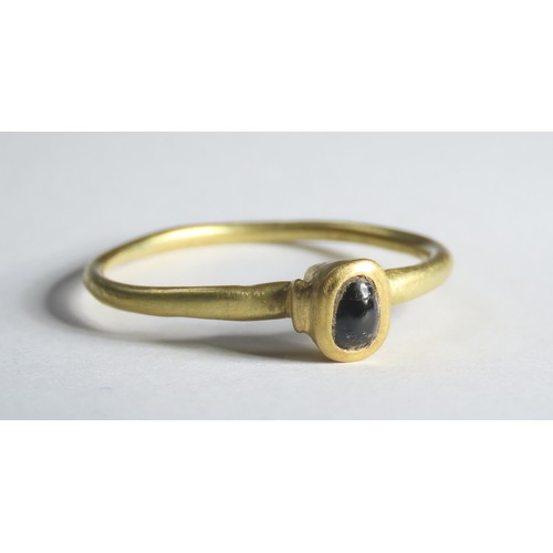 66 - Medieval Gold Ring. Circa 13th-14th century CE. 25mm, 2.05g. An exceptional medieval gem-set finger ... 