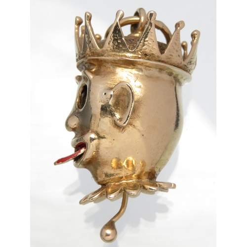 79 - Gold jester head pendant with moving eyes and tongue operated by pulling the lever below the head. A... 