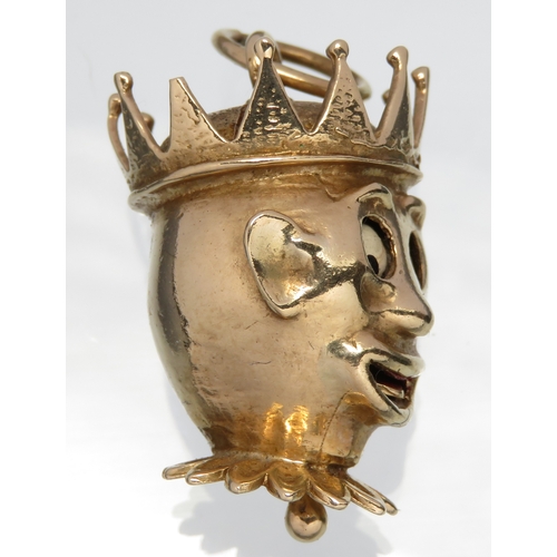 79 - Gold jester head pendant with moving eyes and tongue operated by pulling the lever below the head. A... 