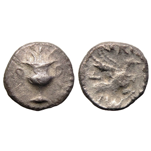 130 - Regini and Artebates: Verica wine cup silver minim. Circa 10-40 AD. Wine cup, REX above. R. Eagle ri... 