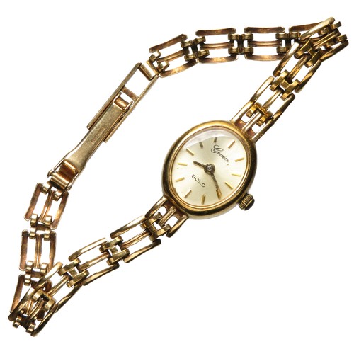 83 - Ladies gold watch, marked Geneve GOLD on the face and hallmarked for 9ct on the case and the clasp. ... 