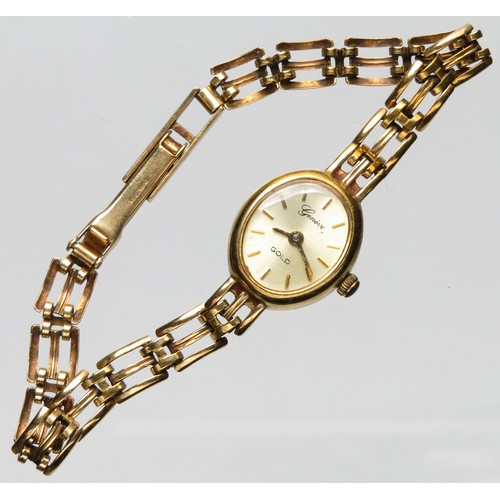 83 - Ladies gold watch, marked Geneve GOLD on the face and hallmarked for 9ct on the case and the clasp. ... 