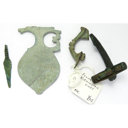 47 - Roman Artefacts (4). Circa 2nd-4th century CE. To include a small nail cleaner, a trumpet brooch, a ... 