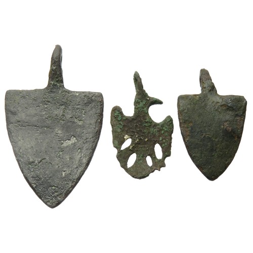 59 - Medieval Heraldic Harness Pendants (3). Circa 14th century CE. To include two shield-shaped pendants... 