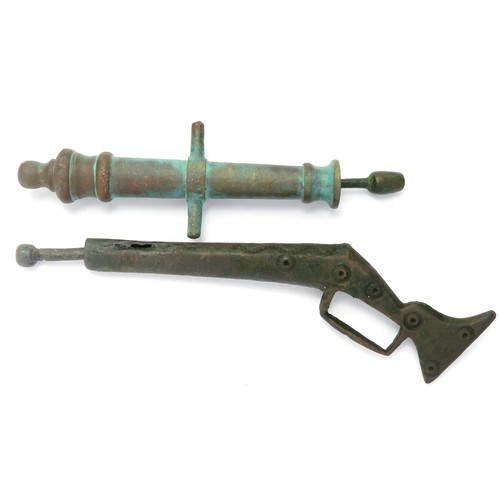 89 - Post-Medieval Toy Firearms (2) circa 17th century, to include a bronze cannon (70mm) and a rifle (92... 