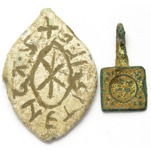 61 - Medieval Artefact Group (2). Circa 14th century CE. To include a large lead vesica seal matrix and a... 