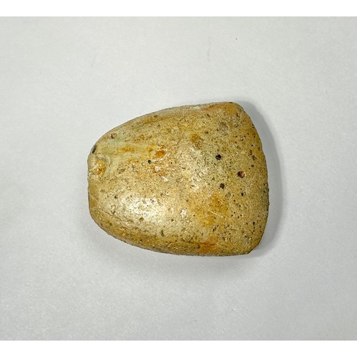 99 - A Neolithic polished scraper. Circa 5000 BCE. 38mm x 34mm. Complete and undamaged with smooth surfac... 