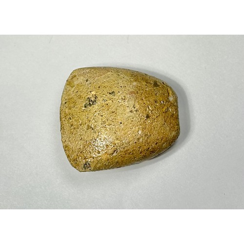 99 - A Neolithic polished scraper. Circa 5000 BCE. 38mm x 34mm. Complete and undamaged with smooth surfac... 