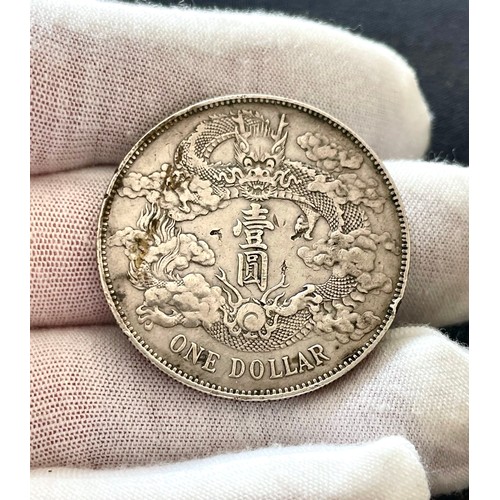 67 - China: Qing Dynasty, Hsuan Tung 1908-11, silver Dollar, 1911, year 3, dragon and clouds around value... 