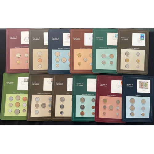 85 - Franklin Mint Series: The Coin Sets of All Nations Collection (59) with green Vol II box. Each set i... 